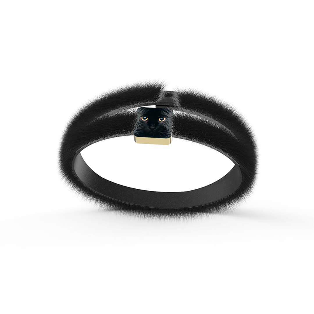 Bracciale in eco pelliccia con finiture dorate